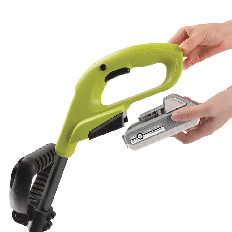 Person putting a 2.0-Ah battery onto the Sun Joe 24-volt cordless stringless 10-inch grass trimmer kit.