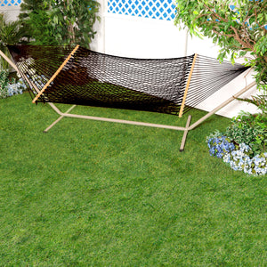 Bliss Hammocks 60-inch Wide Black Cotton Rope Hammock secured to a stand in a backyard.