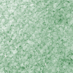 Close-up of the green colored Keep It Green Ice Melt.