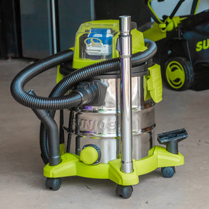 Sun Joe 24-volt Cordless Portable Stainless Steel Wet/Dry Vacuum Kit sitting in a garage.