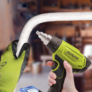 Person using the Sun Joe 24-volt cordless Heat Gun to make a tube malleable.