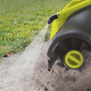 Sun Joe 24-volt cordless Cordless Surface & Patio Cleaner Kit being used to spray and clean a driveway.