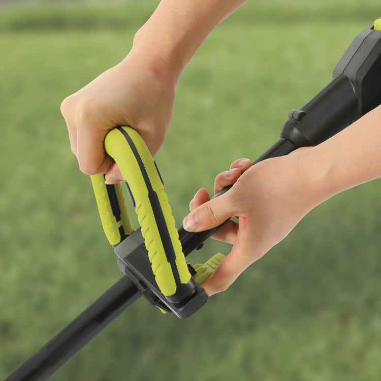 Person adjusting the handle on the Sun Joe 24-volt cordless 14-inch string trimmer kit.