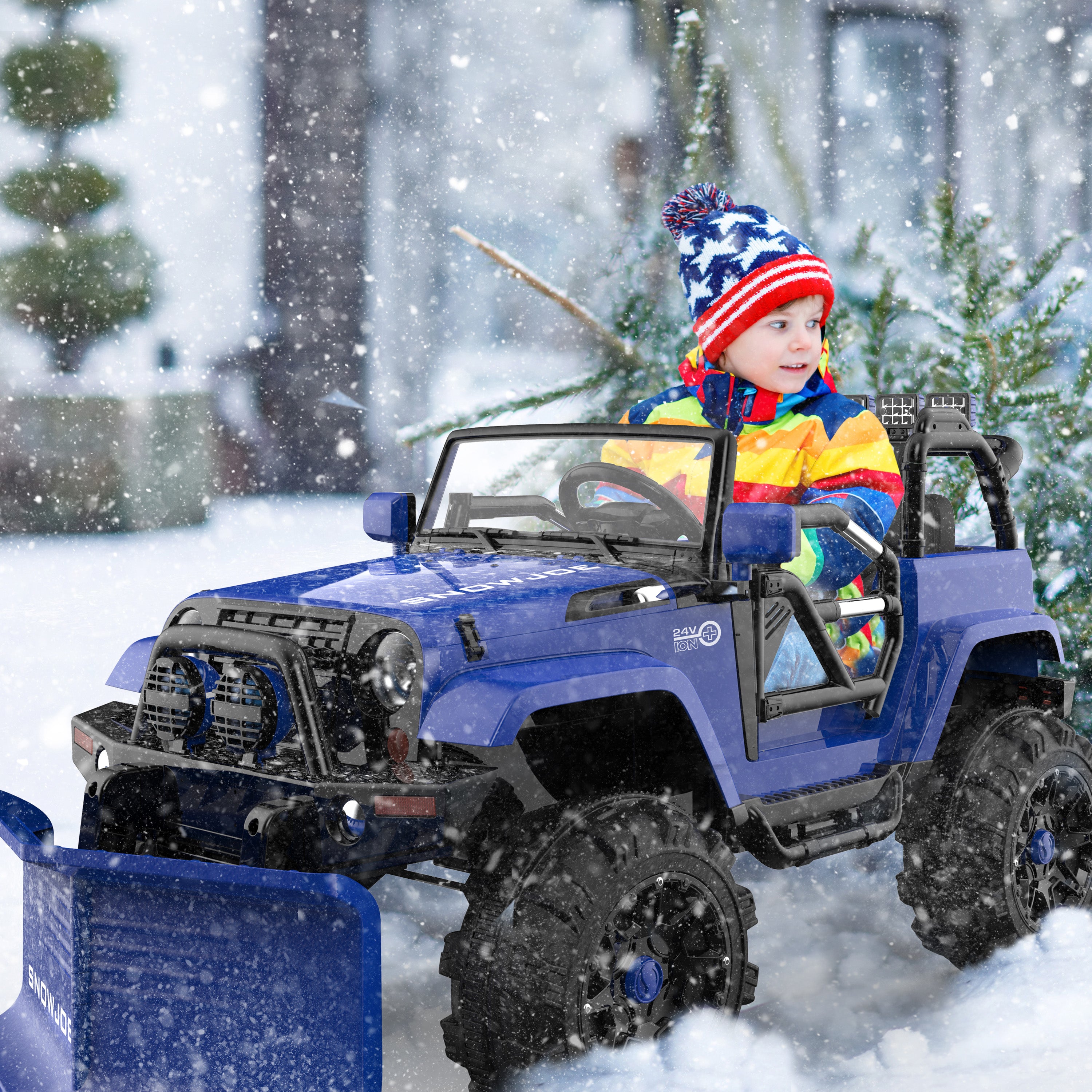 Child riding 24V SUV in snow