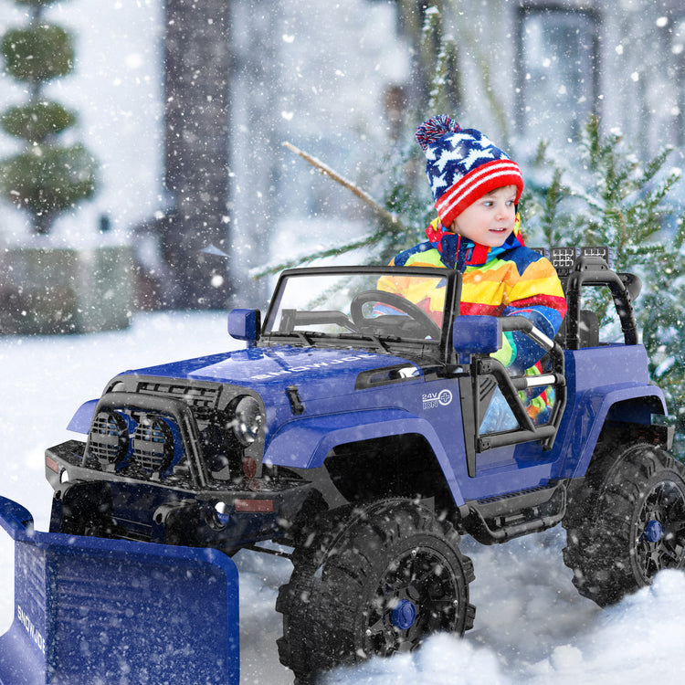 Child riding 24V SUV in snow