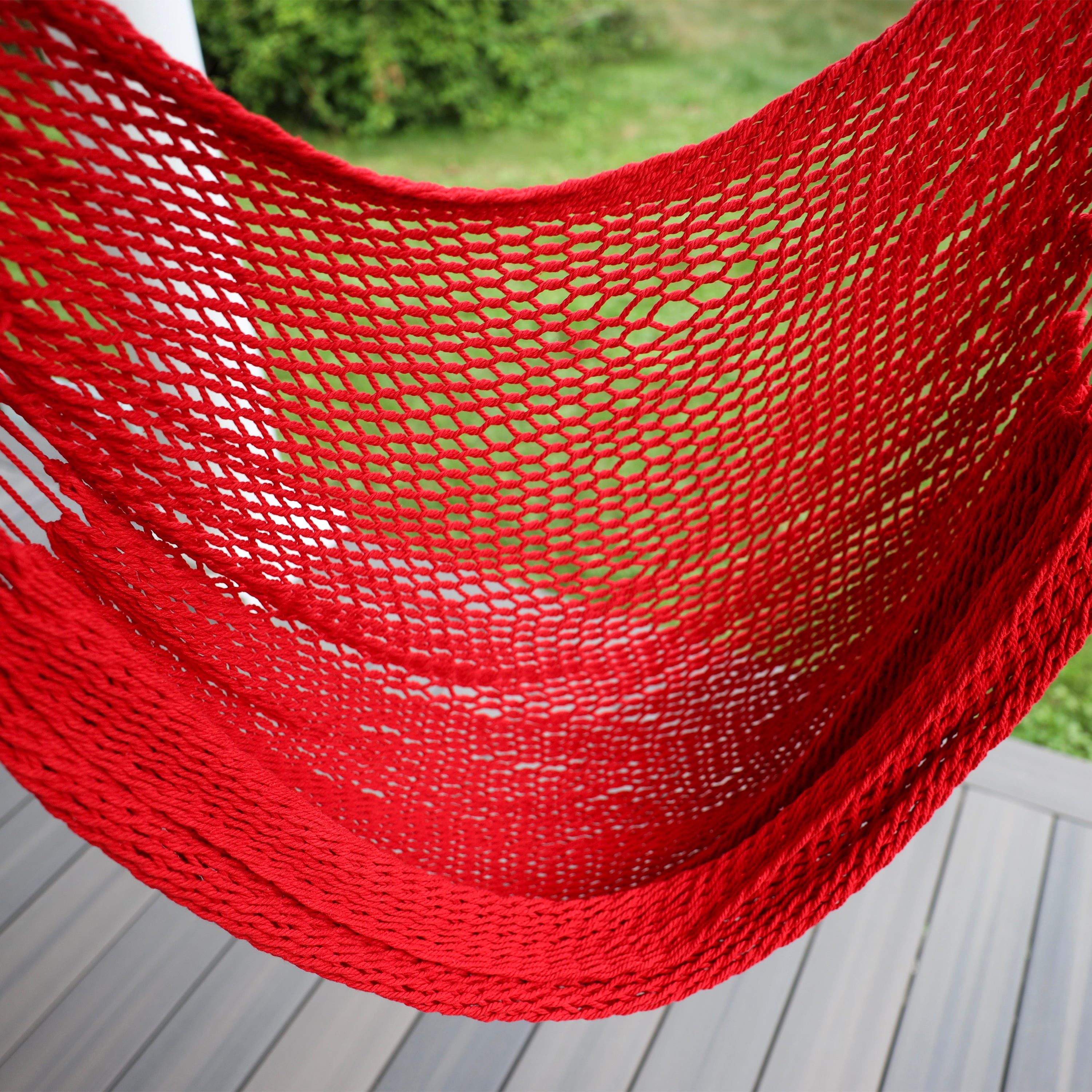 Close-up of the seating area on the Bliss Hammocks 40-inch Red Island Rope Hammock Chair.
