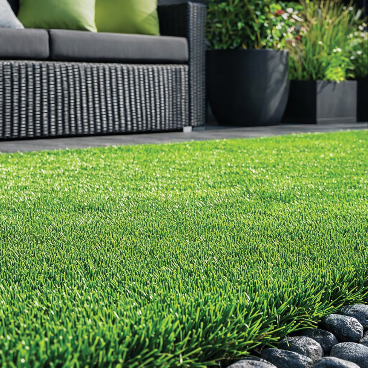 Artificial grass tiles refreshing an outdoor seating area