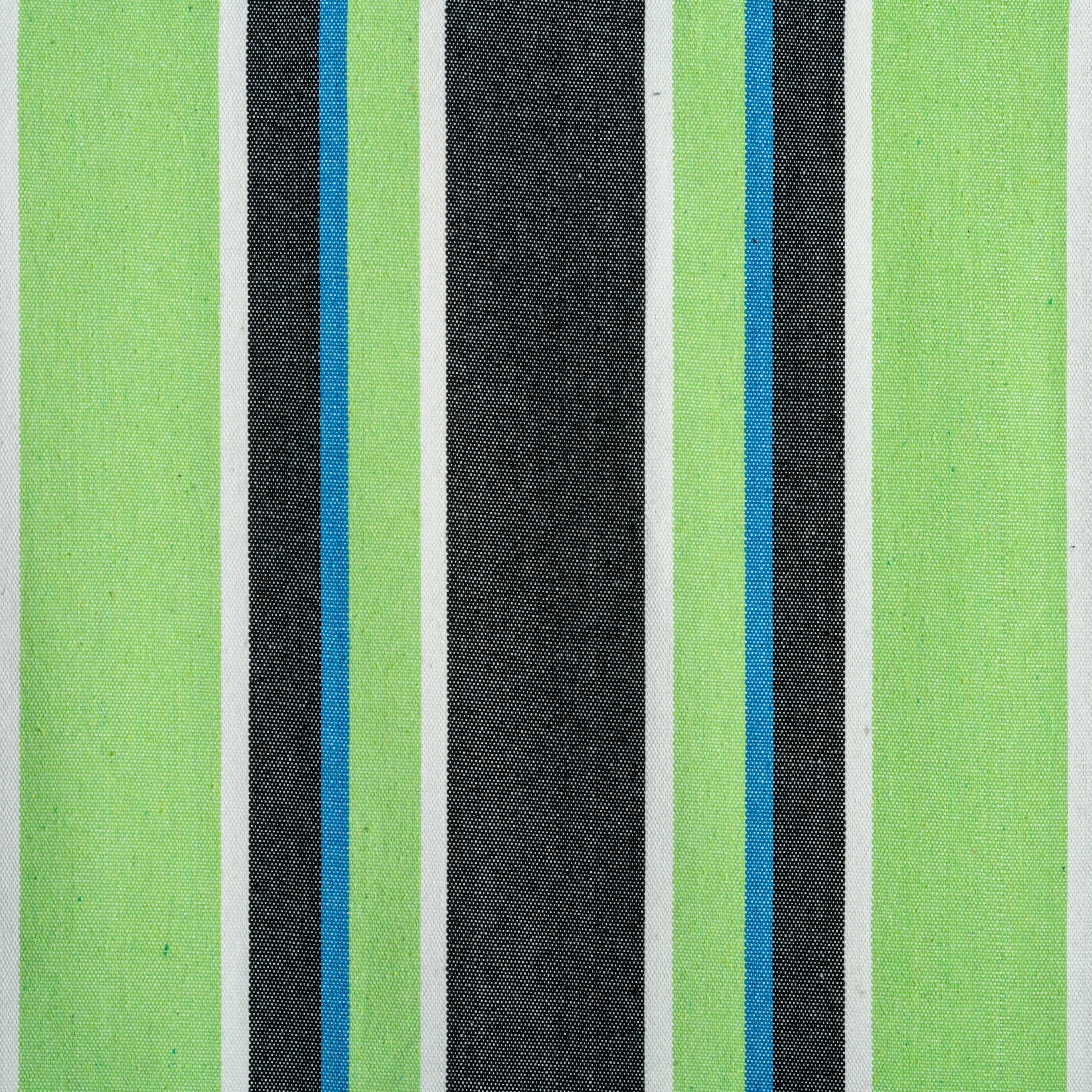 Close-up of the fabric and pattern showing the light green, blue, black, and white stripes.