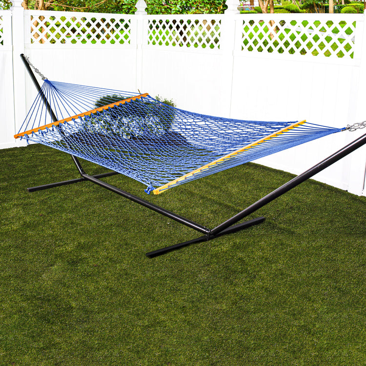 Bliss Hammocks 60-inch Wide Blue Cotton Rope Hammock secured to a stand in a backyard.