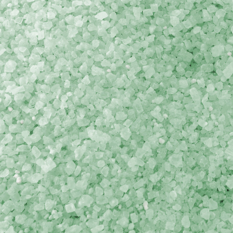 Close-up of the green colored Keep It Green Ice Melt.