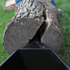 Close-up of the log being split on the Sun Joe 10-ton Hydraulic Log Splitter.