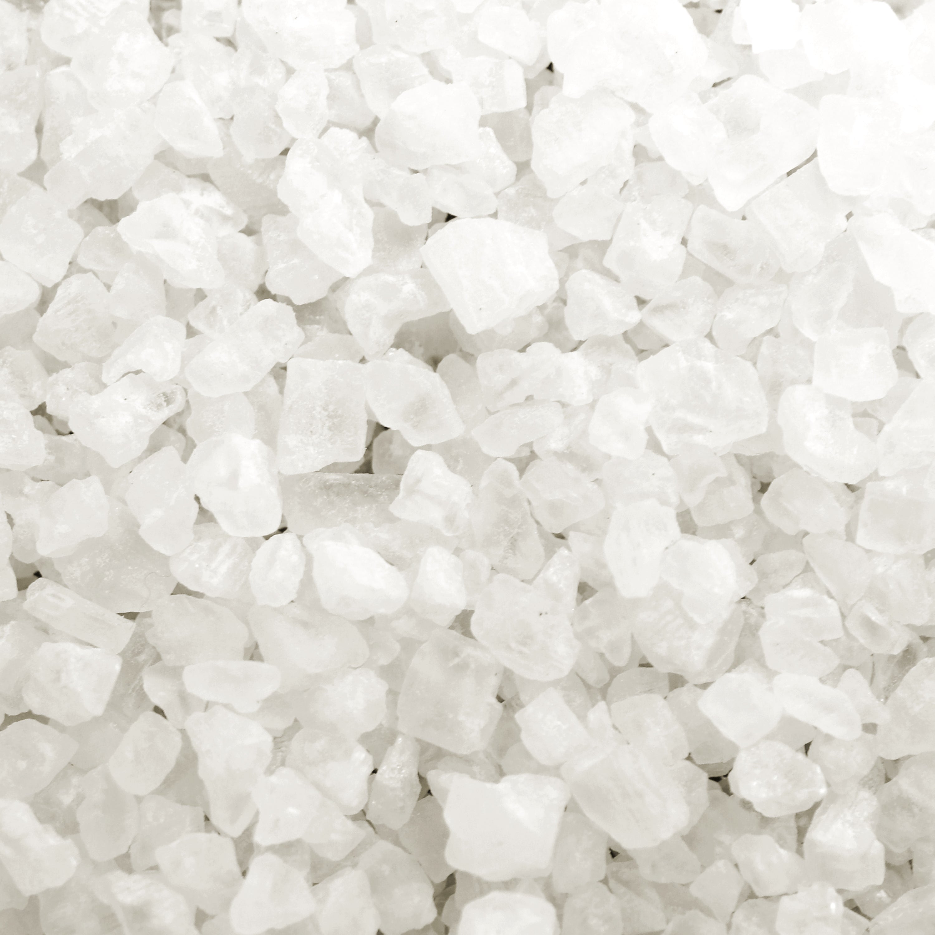 Close-up of the Pure Sodium Rock Salt Ice Melter.