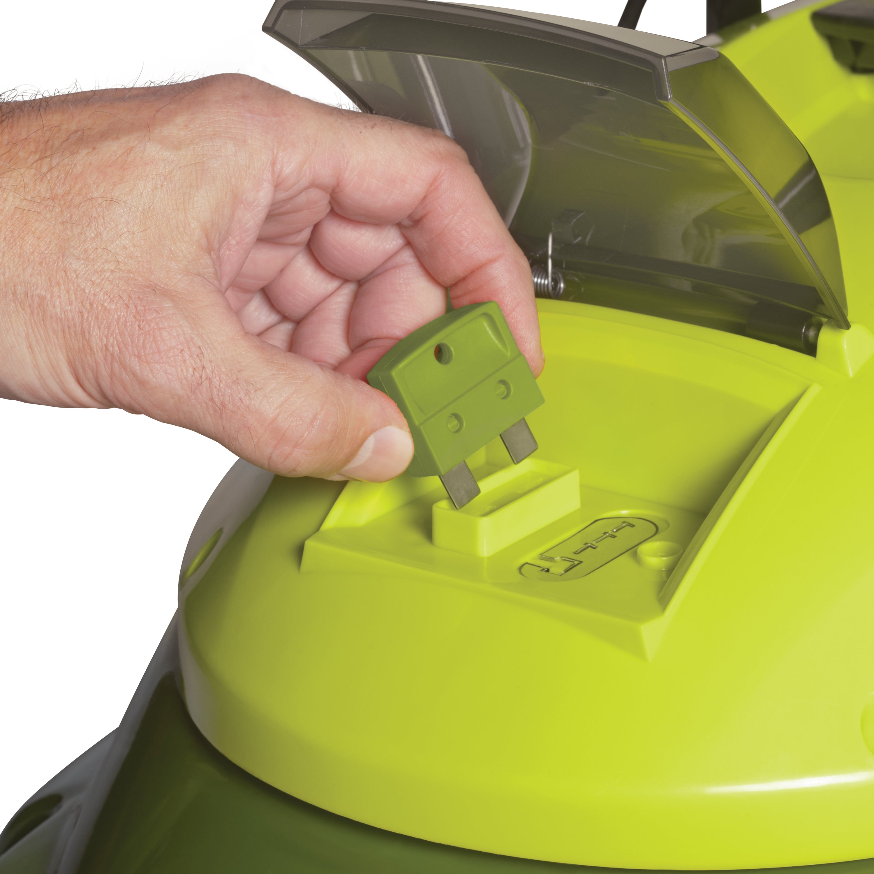 Person inserting the safety key into the Sun Joe 28-volt 5-amp 14-inch Brushless Cordless Lawn Mower.