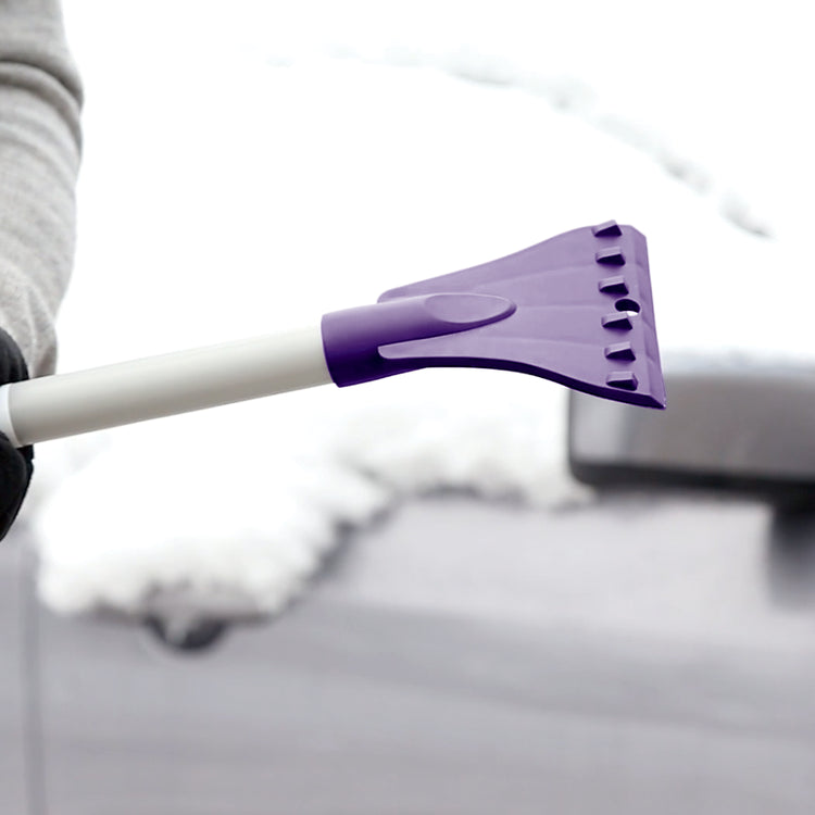 Close-up of the ice scraper on the Snow Joe 19-inch 2-In-1 Telescoping purple Snow Broom and Ice Scraper.