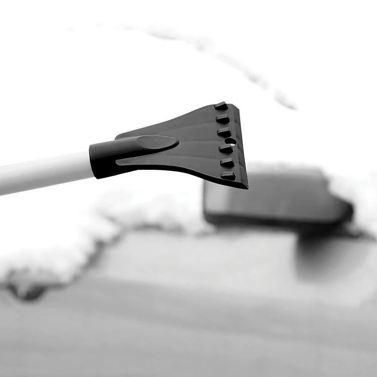 Close-up of the ice scraper on the Snow Joe 19-inch 2-In-1 Telescoping black Snow Broom.