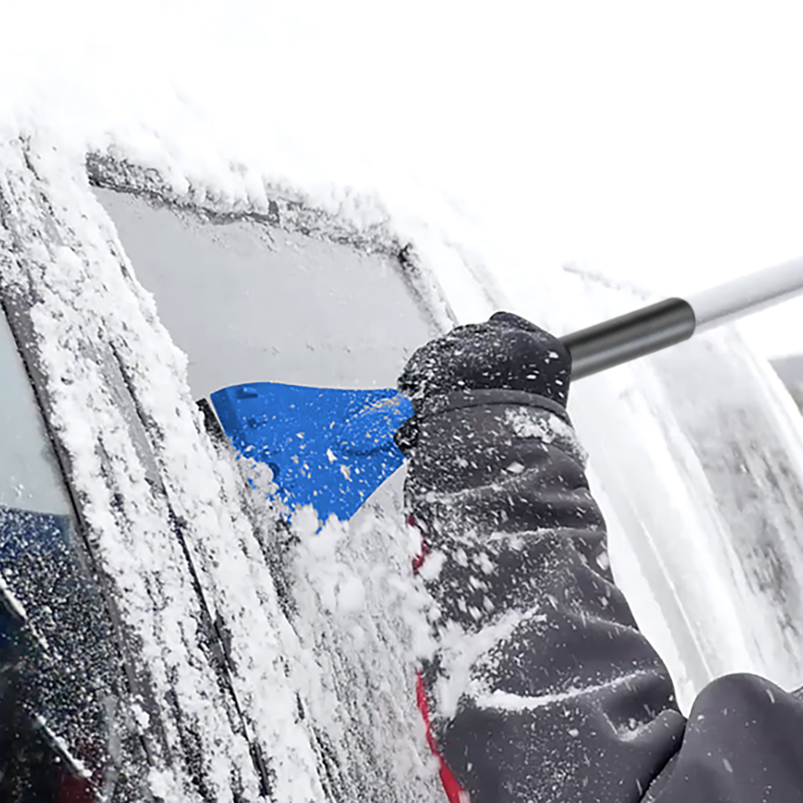 ice scraper of SJBLZD-LED being used to scrape ice off the window of a car