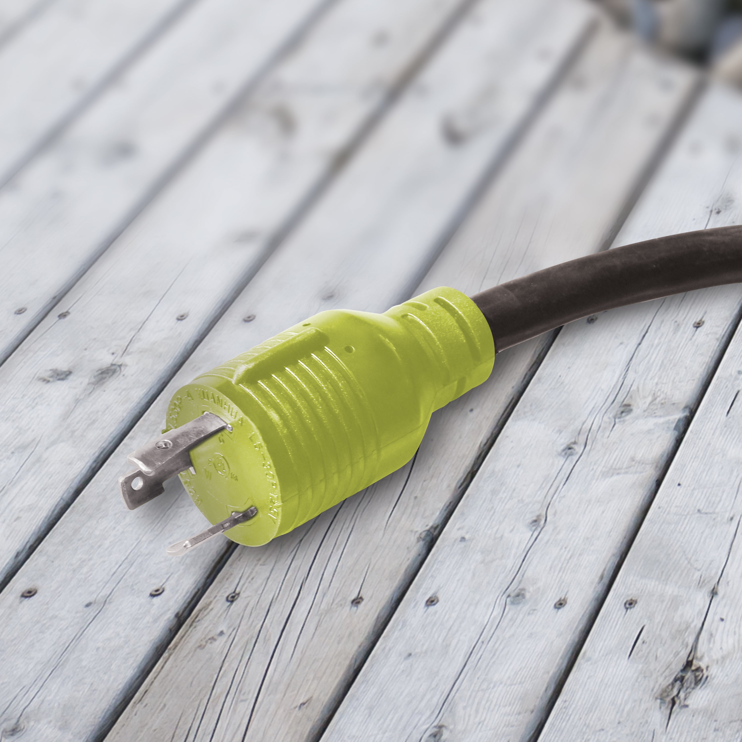 Close-up of the plug on the Snow Joe and Sun Joe 25-foot 3-outlet power cord for generators.