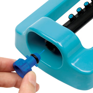 Close-up of the cleaning pin for the Aqua Joe Indestructible Metal Base Oscillating Sprinkler.