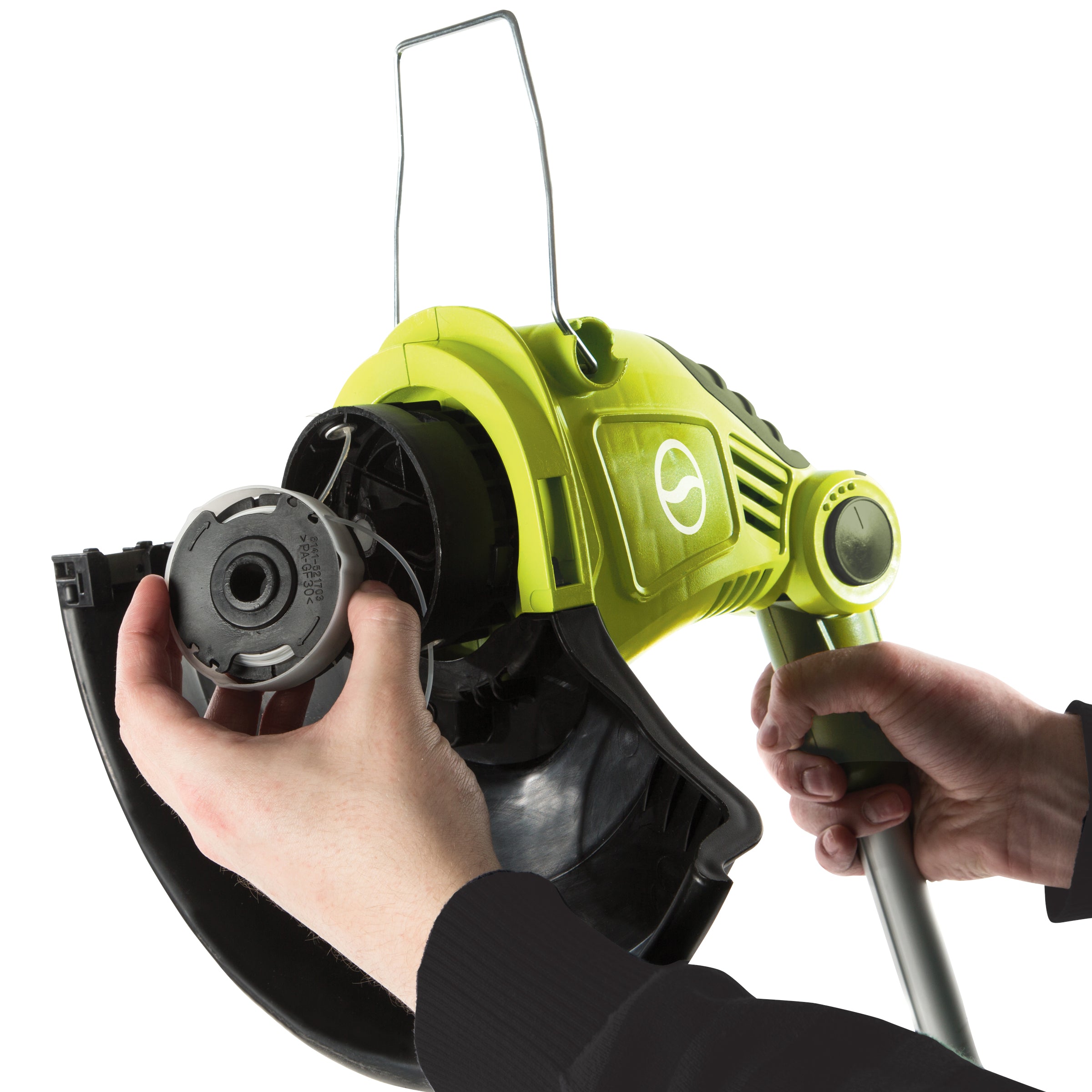 Person replacing the spool on the Sun Joe 4-amp 13-inch Electric String Grass Trimmer.