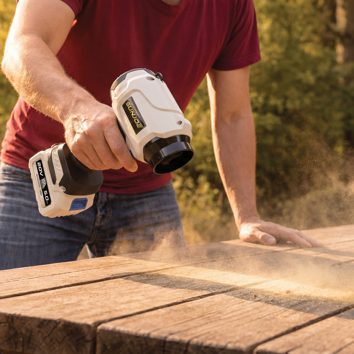 X20-STORMJET-TV1 clearing sawdust from a work surface